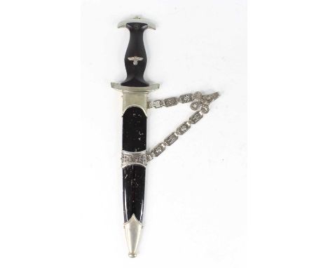 A German Third Reich SS (Shutzstaffel) dagger, the 22cm double edged blade etched "Meine Ehre heisst Treue" (My honour is loy