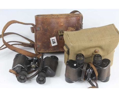 A pair of Air Ministry binoculars, marked GE/471, in a WW II canvas webbing pouch marked M.E.Co. 1940, together with a pair o