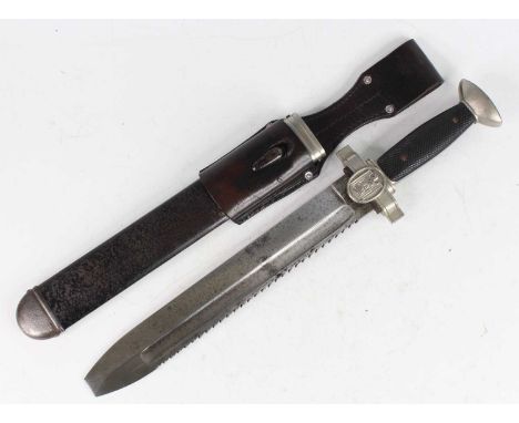 A German Third Reich Rotes Kreuz (Red Cross) hewer dagger, the 27cm fullered blade with saw back and chisel point marked to t