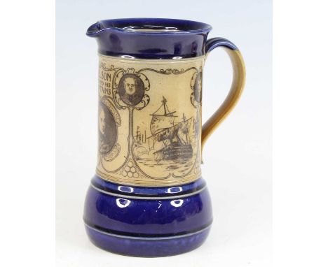 An early 20th century Royal Doulton Nelson commemorative stoneware jug, on a blue ground transfer printed with portraits of N