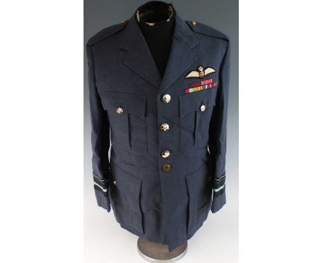 An R.A.F. tunic for an Air Vice-Marshal, having and RAF badge and medal ribbons for MBE and WW II etc. with matching trousers