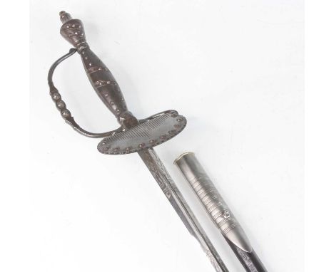 An English court sword, the 79cm triform steel blade etched with foliage, having a steel clam shell languet with a D-shaped k