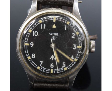 A 1960's Smiths British Military Issue gentleman's wristwatch, having a signed black enamel dial with Arabic numerals and lum