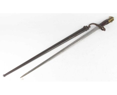 A French Model 1874 Gras bayonet, the 52.5cm blade inscribed to the back edge Mre d' armes de Chat 1874, having a hooked quil