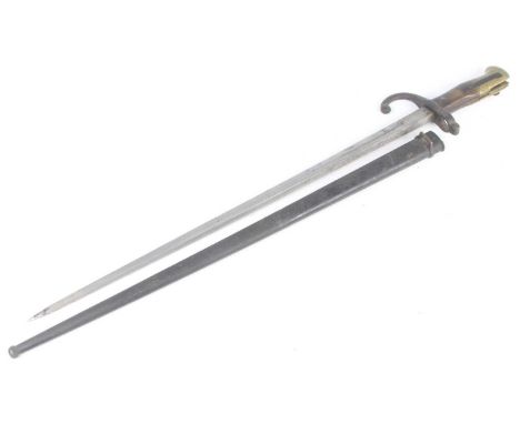 A French M1874 Gras bayonet, having a 52cm blade, the hooked quillon numbered 16362?, with a two piece walnut grip and brass 