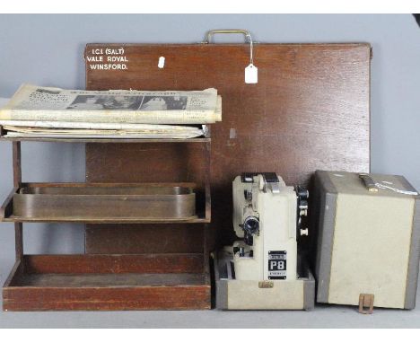 Lot to inlcude a vintage Eumig projector, a wooden I.C.I folio case, vintage desktop document tray, Royal commemorative newsp