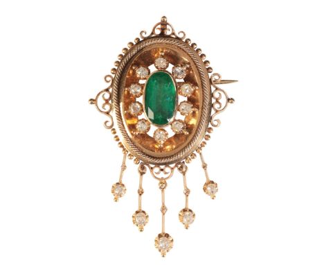 AN ETRUSCAN REVIVAL EMERALD AND DIAMOND BROOCH / PENDANTin 18ct gold, set with an oval-cut emerald measuring c.12.8x7.5mm hel