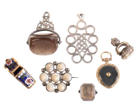 A COLLECTION OF JEWELSincluding a poison ring in sterling silver, full British hallmarks, a mourning locket pendant in chased