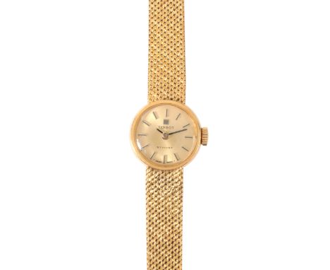 TISSOT 'STYLIST': A LADY'S 18CT GOLD DRESS WATCHwith manual wind movement, the gold tone dial with baton hour markers and swo