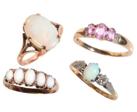 FOUR GEM-SET RINGSincluding an opal and diamond three stone ring in 18ct gold and platinum, an antique opal five stone ring i