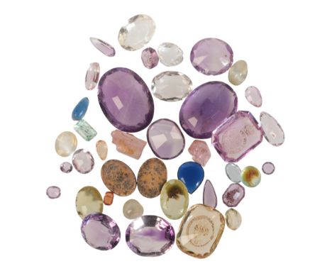 A COLLECTION OF FACETED AND ROUGH GEMSTONESincluding amethysts, citrines, lapis lazuli, carved intaglios, micro-mosaics, aqua