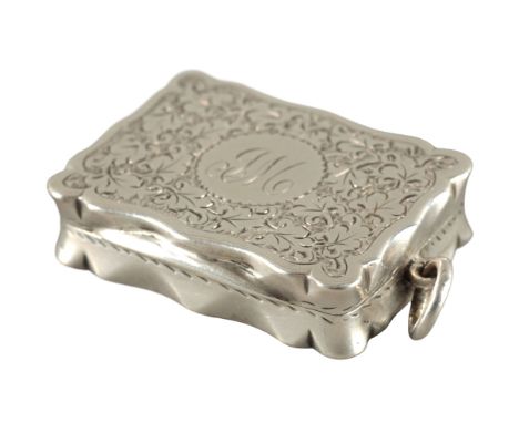 A VICTORIAN SILVER VINAIGRETTEby Colen Hewer Cheshire, Birmingham 1889, the shaped rectangular body engraved with leaves, wit