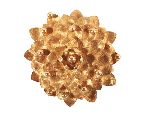 A VINTAGE WATER LILY BROOCHin 18ct gold, with textured finish and beaded detailing, secured with a pin clasp, full British im