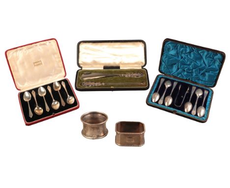 A VICTORIAN BOXED SET OF SILVER SPOONS AND TONGSby Henry Wilkinson & Co, Sheffield 1881; together with a boxed set of six sil