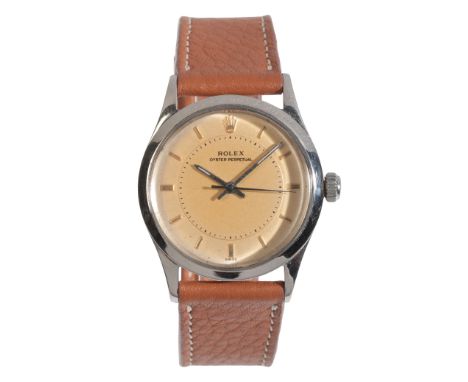 ROLEX OYSTER PERPETUAL: A GENTLEMAN'S STAINLESS STEEL WRISTWATCHwith manual wind movement, the gold dial (tropical) with gold