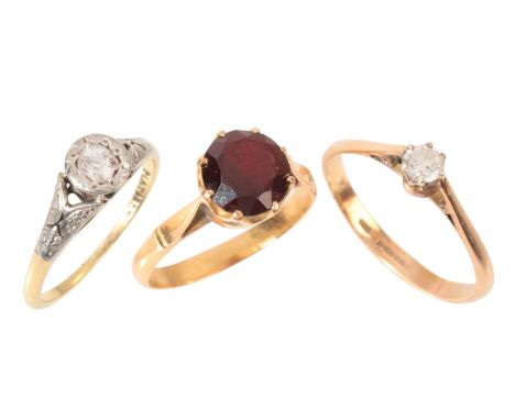 THREE GEM-SET RINGSin 18ct gold, including a diamond solitaire ring in 18ct gold and platinum, set with an old mine cut diamo