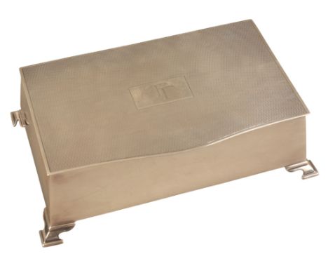 AN ELIZABETH II SILVER CIGARETTE BOXby William Adams, Birmingham 1957, of Art Deco style with engine turned top, angled sides