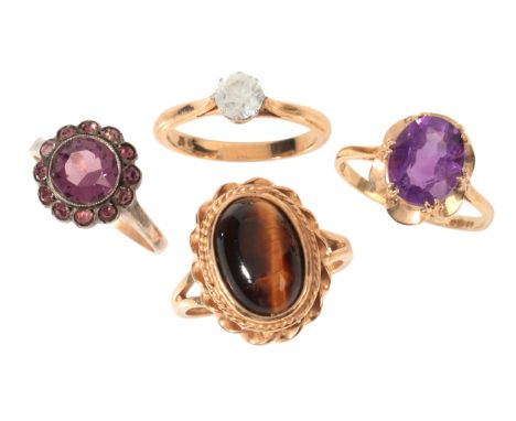 A COLLECTION OF GEM-SET RINGS&nbsp;including a tiger's eye dress ring in 9ct gold, set with a tiger's eye cabochon of c.2.24 