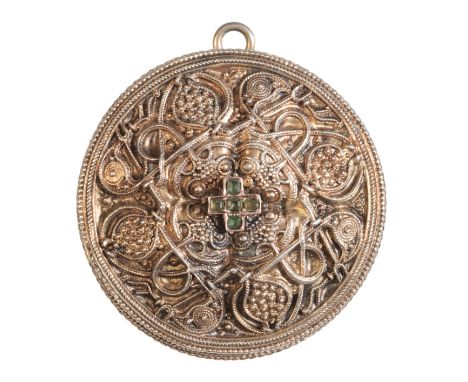 PAUL TELGE: AN ARCHAEOLOGICAL REVIVAL EMERALD PENDANTin silver gilt, set with a cross motif of step cut emeralds over a styli