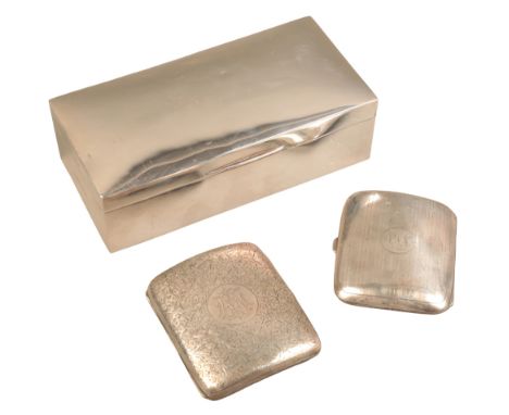 A GEORGE V SILVER CIGARETTE BOXby William Neale & Co, cedar lined, 19cm wide; together with two silver cigarette cases, Sheff