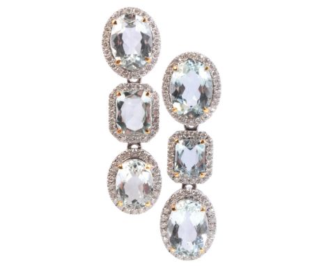 A PAIR OF AQUAMARINE AND DIAMOND DROP EARRINGSin 18ct white gold, each set with alternating oval cut and step cut aquamarines