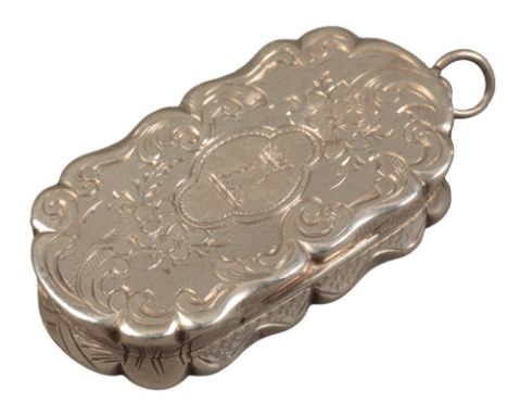 A VICTORIAN SILVER VINIAGRETTEby Robert Mitchell, Birmingham 1864, of shaped oval outline, the lid with floral engraving, the