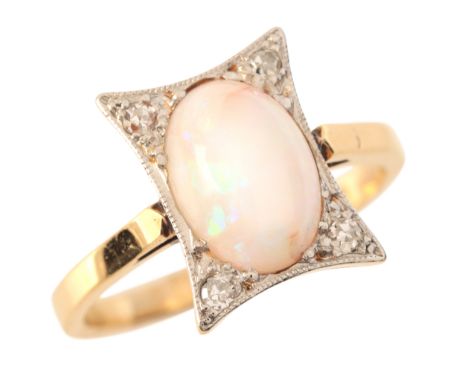 AN ANTIQUE OPAL AND DIAMOND RINGin 18ct gold and platinum, set with an opal of c.1.65 carats, held in a stylised setting set 