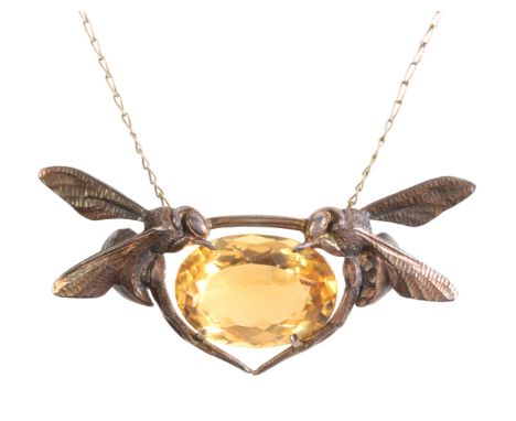 MAURICE DAURAT: A VESPA PENDANT NECKLACEin sterling silver, set with an oval cut citrine, held in a four-claw setting to a mo
