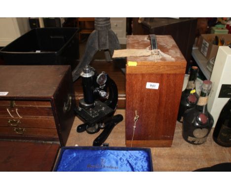 A Beck of London 22413 microscope and a wooden case