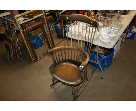 A stick back rocking chair 