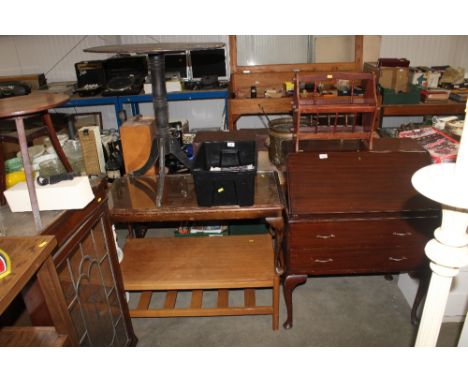 A mahogany bureau, magazine rack, a corner cupboard, two coffee tables, a two tier plant stand, a tripod stool and an occasio