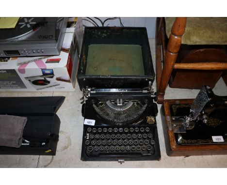 An Imperial typewriter in case 