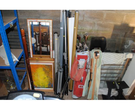 A quantity of various projector screens and stands