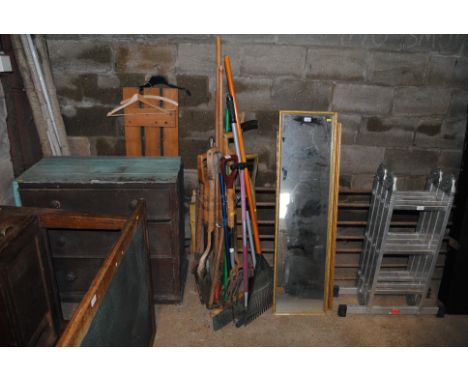 A quantity of various gardening tools to include rake; digging fork; broom; shovel etc.