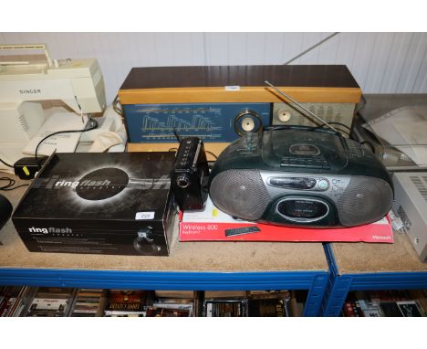A ring flash adapter, a wireless keyboard, compact disc player and a Pure DAB radio