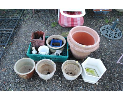 A quantity of various plastic and glazed plant pots, garden ornaments etc. 