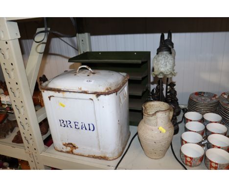 An enamel bread bin AF; a pottery jug; metal filing trays and a pair of decorative lamps