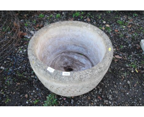 A Cotswolds Studios Ltd. concrete planter with lattice patterning to exterior 