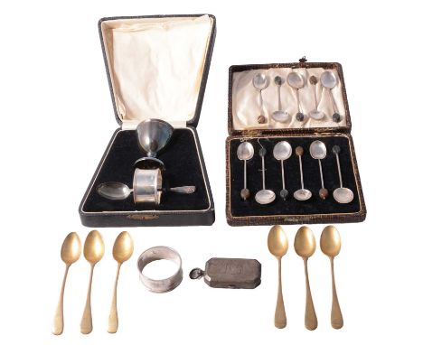 A silver three-piece Christening set, William Suckling Ltd, Birmingham 1927, comprising egg cup, teaspoon, and napkin ring, i