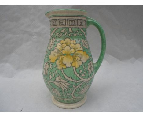 A 1940s HJ Wood Bursley Ware tall jug, designed by Charlotte Rhead in the TL27 pattern, having a tube-lined decoration of sty