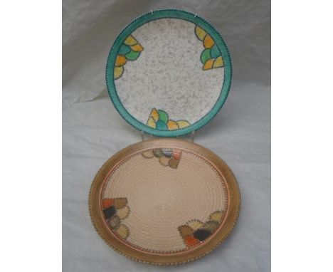 Two 1930s Crown Ducal wall plaques, designed by Charlotte Rhead in the 4015 (green) and 4088 (brown) Patch patterns, each hav