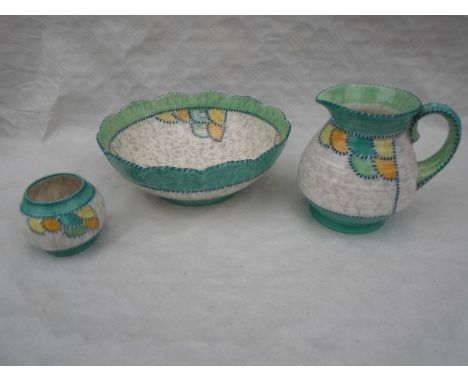 Three items of 1930s Crown Ducal ceramics, designed by Charlotte Rhead, each in the 4015 Patch pattern, comprising a large bo