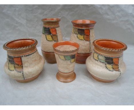 Five 1930s Crown Ducal vases, designed by Charlotte Rhead in the 4088 Patch (variation) pattern, each having a tube-lined dec