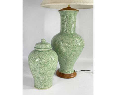 MODERN THAI CELADON LAMP &amp; COVERED JAR, carved with foliage, lamp 54cm h (to rim), jar 34cm h (2)