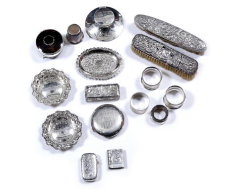 A small quantity of miscellaneous silverwares including a small pair of dishes, a Capstan inkwell, two brushes, a trinket box