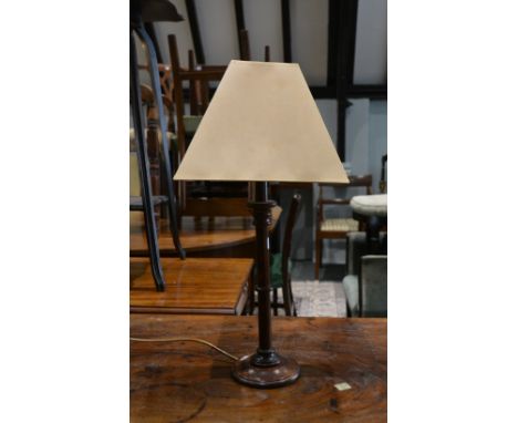 An oak table lamp with shade