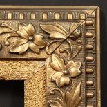 A decorative gilt frame with pebbled slip, rebate size - 8" x 10" (20.5 x 25.5cm).