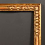 A 20th Century Continental carved wood frame, rebate size - 31.5" x 41.5" (80 x 105cm).