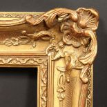 A 20th Century Continental gilt composition frame, rebate size - 12.5" x 20.5" (32 x 52cm).