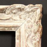 An early 20th Century French carved frame, rebate size - 16.5" x 19.75" (42 x 50cm).